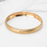 Bracelet jonc - Or 10K jaune gravé motif traditionnel 10mm - BRG305
