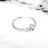 Lady's ring - 10K white gold thin cz pave nail - RIG449