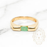 Bague - Or 10K jaune émeraude coupe ovale 0.22CT sertie sous tension - RIG572