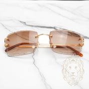 Lunettes Cartier – Cartier Picadilly Big C or avec verres coupe diamant en brun dégradé – CT0092O-001