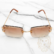 Lunettes Cartier – Cartier Picadilly Big C or avec verres coupe diamant en brun dégradé – CT0092O-001