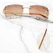 Lunettes Cartier – Cartier Picadilly Big C or avec verres coupe diamant en brun dégradé – CT0092O-001