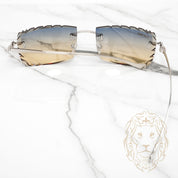 Lunettes Cartier –  Cartier Panthère argent avec verres coupe diamant or bleu dégradé - CT0058O-003