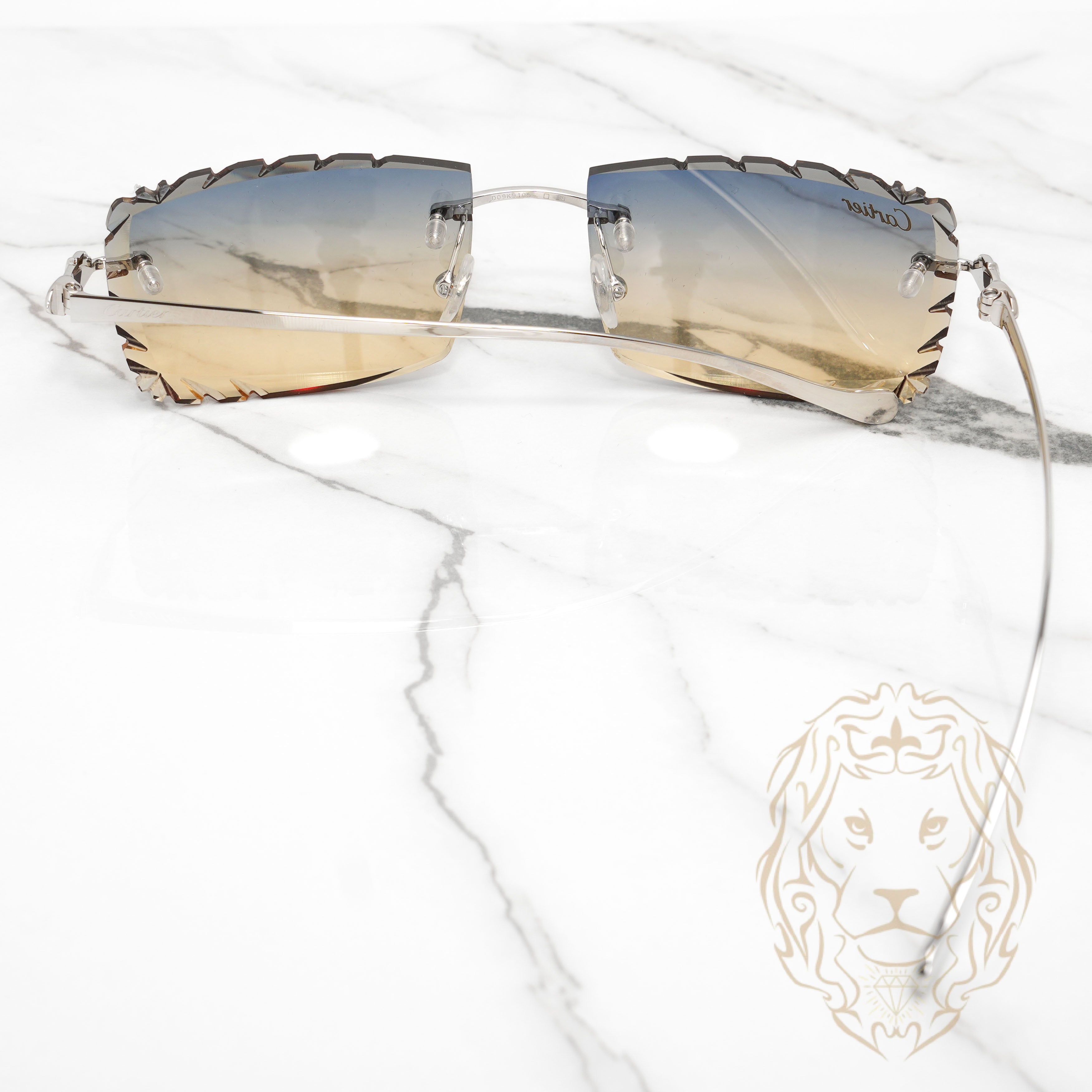Lunettes Cartier –  Cartier Panthère argent avec verres coupe diamant or bleu dégradé - CT0058O-003