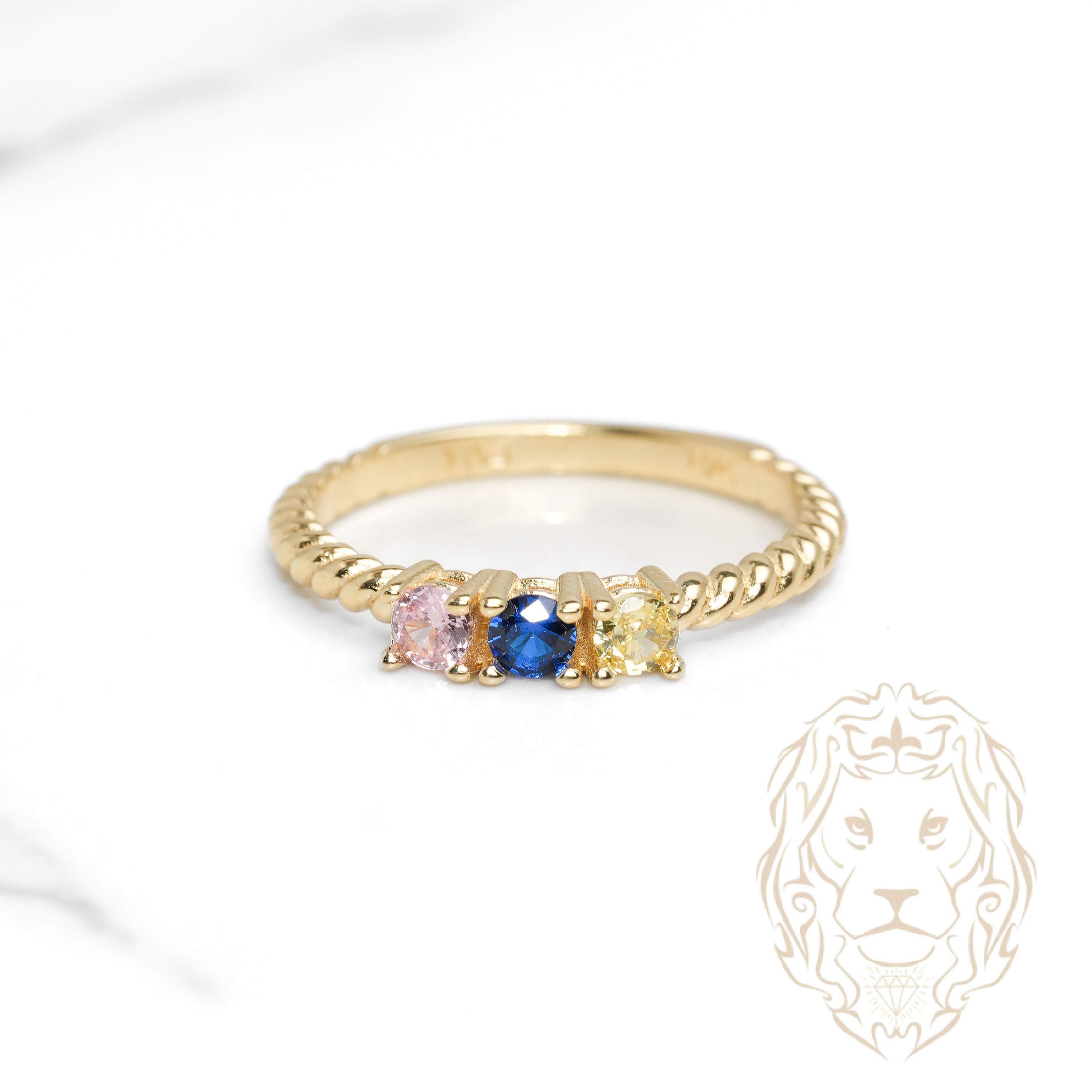 Bague - Or 10K jaune trois pierres cz & twist - RIG1109