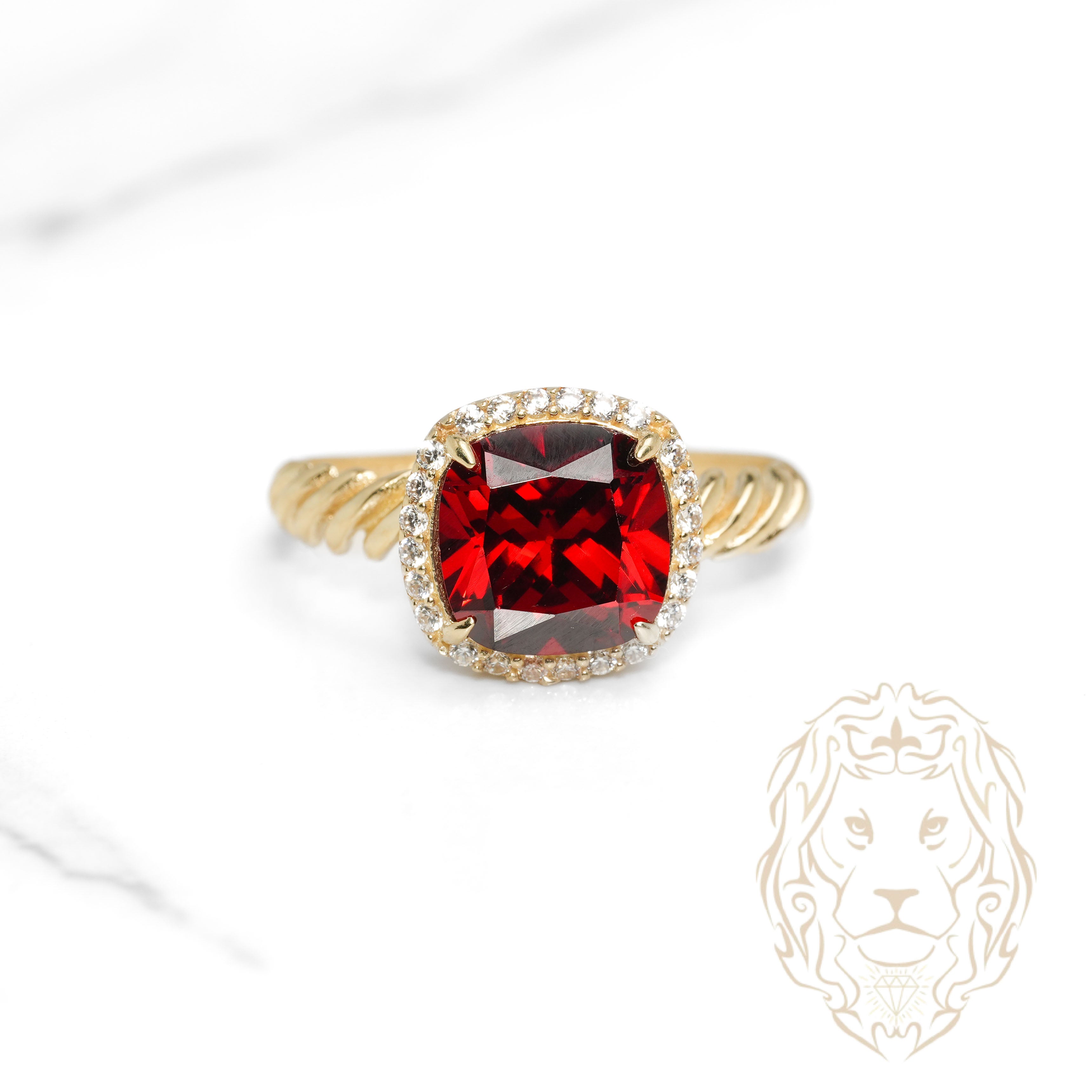 Bague - Or 10K jaune halo pierre cz rouge coupe cousin & monture twist - RIG1110