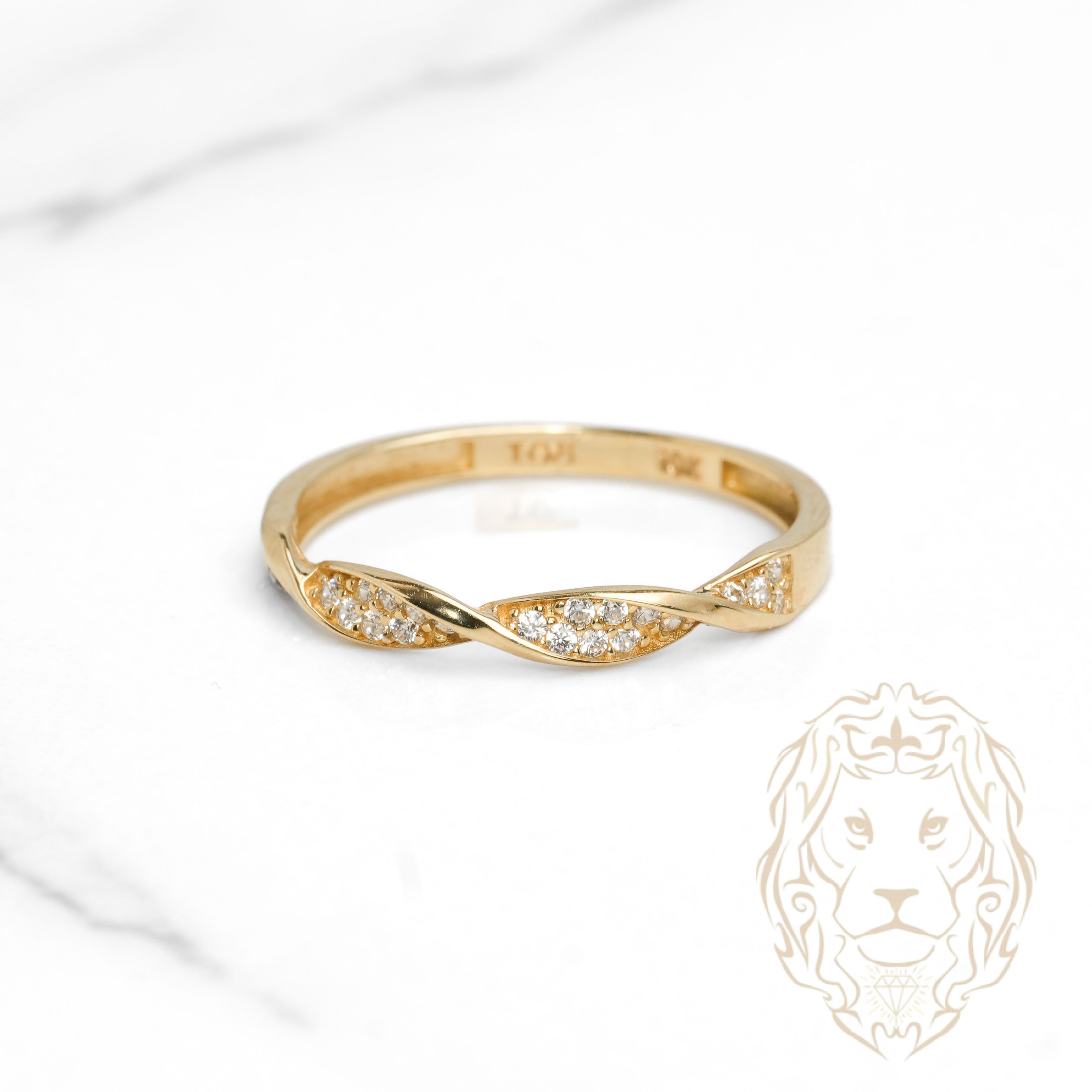 Bague - Or 10K jaune twist pavé de cz - RIG1123