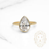 Bague - Or 10K jaune solitaire pierre cz coupe poire sertie clos - RIG1135