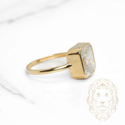 Bague - Or 10K jaune solitaire pierre cz coupe émeruade sertie clos - RIG1136