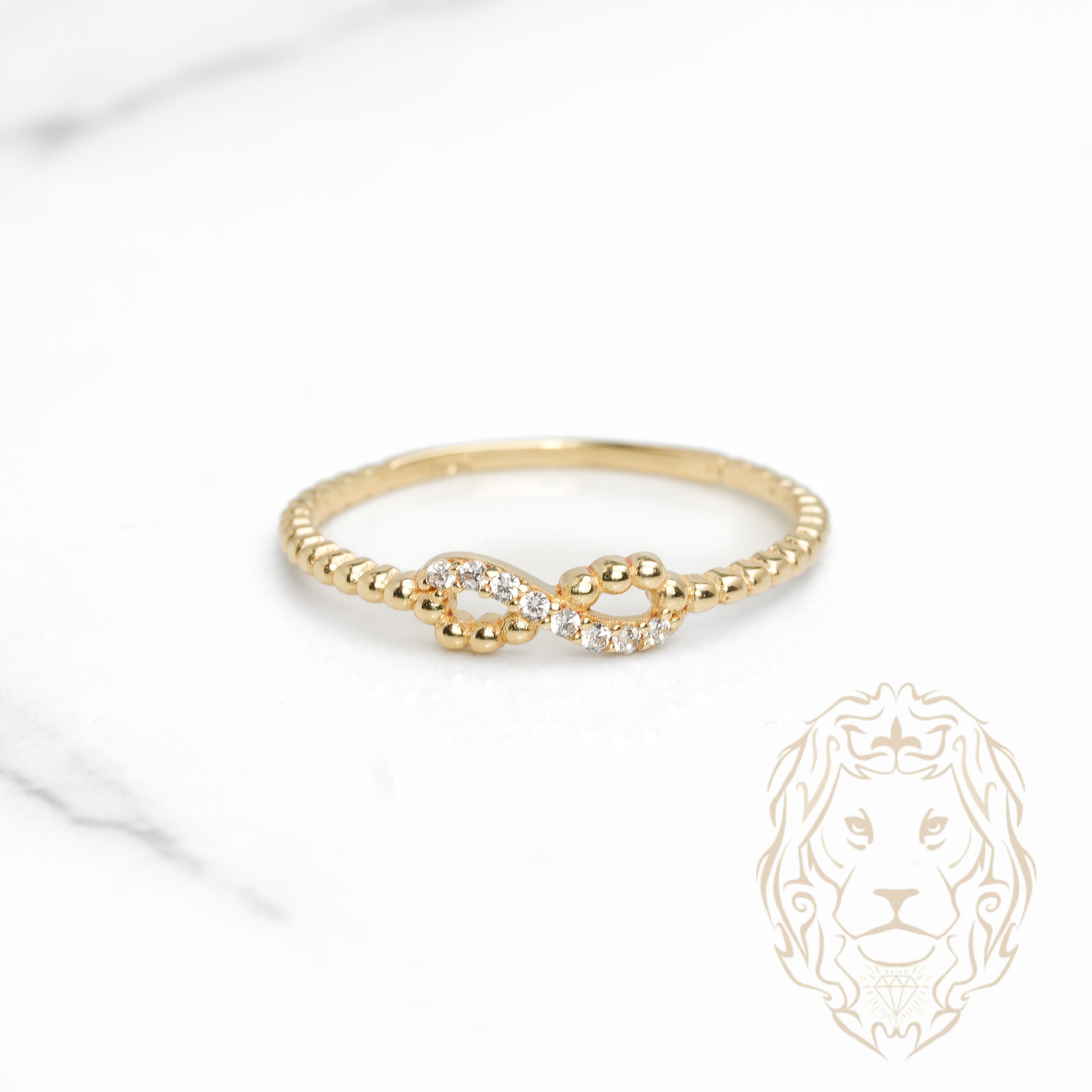 Bague - Or 10K jaune infini pavé de pierres cz & perlée - RIG1144