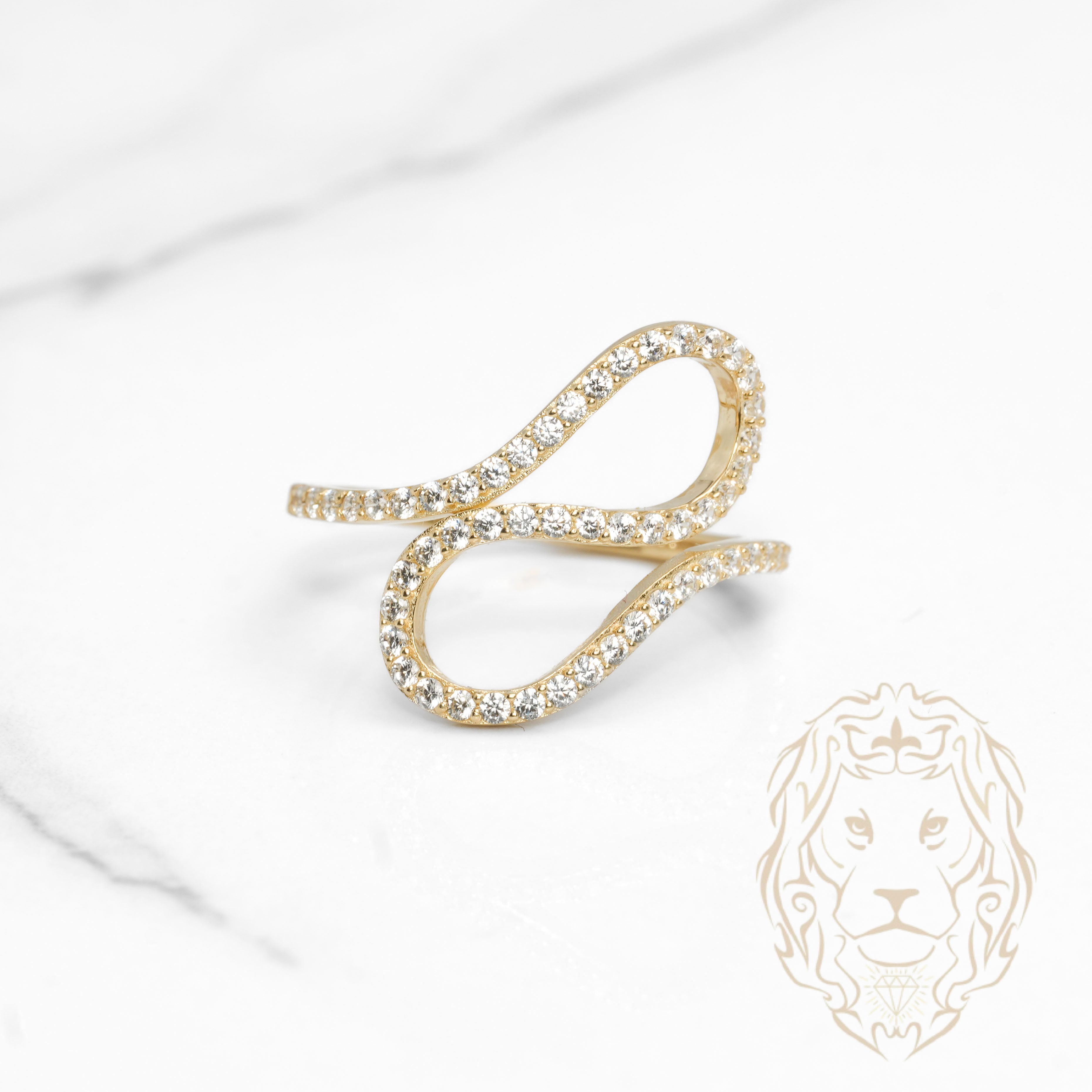 Bague - Or 10K jaune forme fluide pavé de cz - RIG1148
