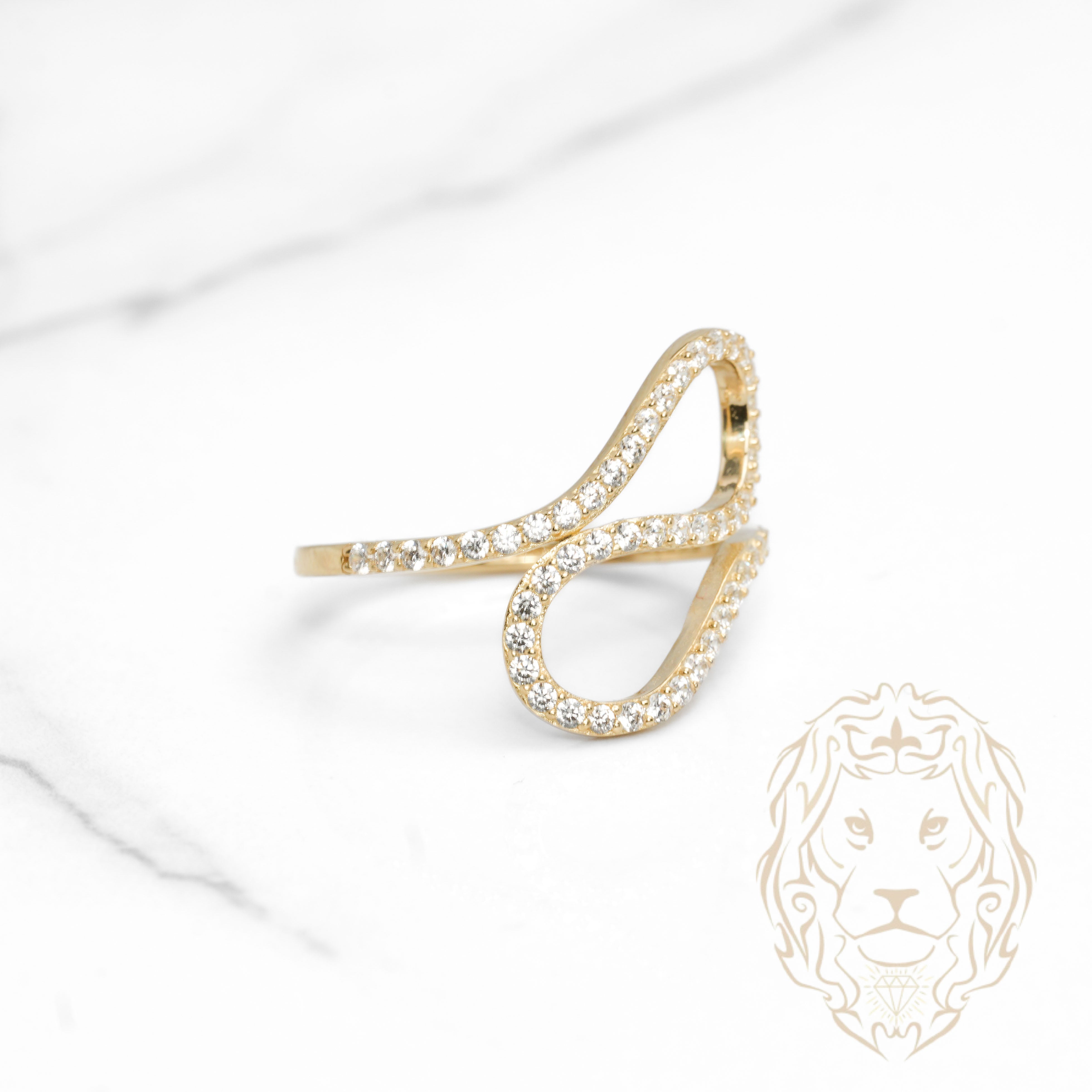 Bague - Or 10K jaune forme fluide pavé de cz - RIG1148