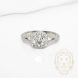 Bague - Argent halo pierre AAA coupe ronde 1.20CT & tige fendue pavée - RIS1422