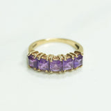 Lady's ring - 10K gold five princess cut stones yellow cz mauve - RIG124