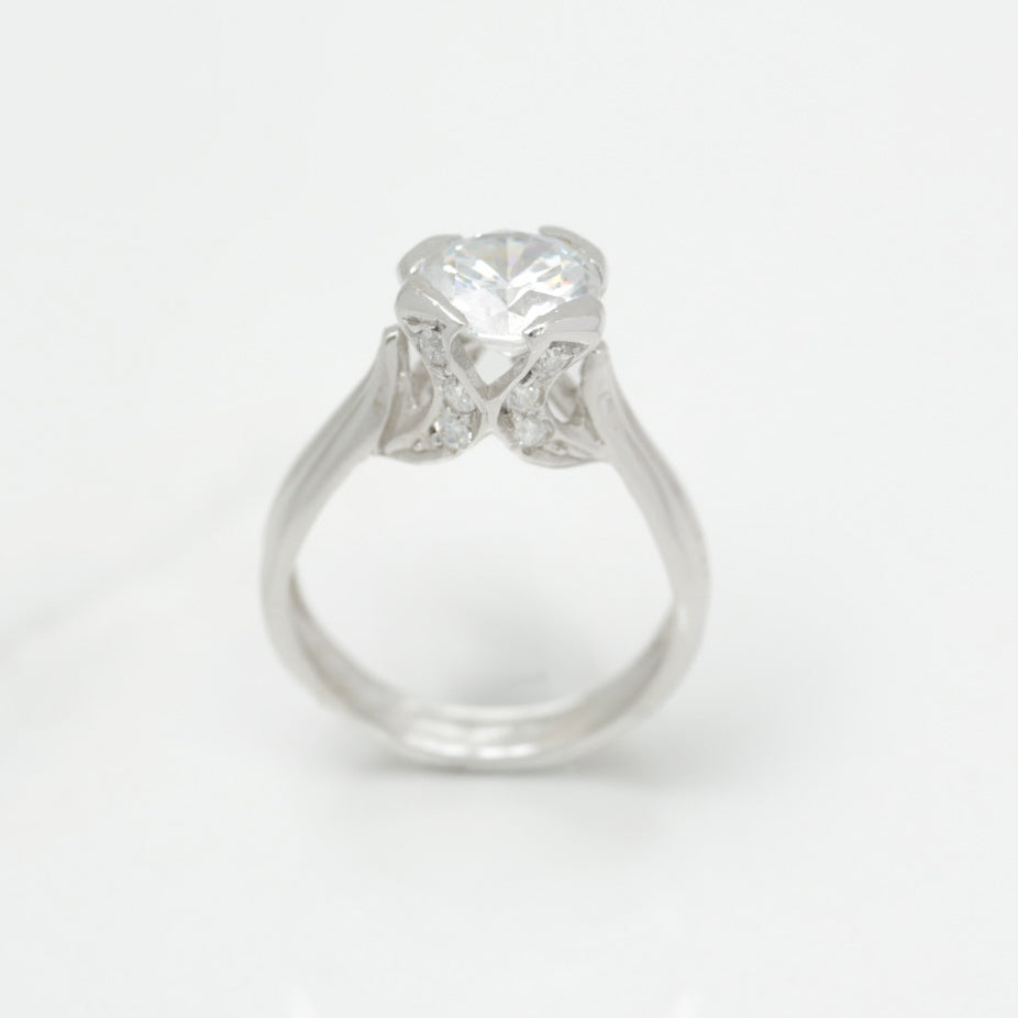 Lady's ring - Polished white 10K gold with stone & cz pave setting - RIG218