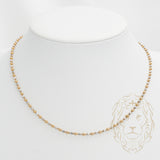 Chain - 10K gold two-tone yellow & white beads polished & brilliant cut 2.5mm - CHG564