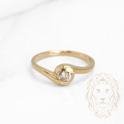 Engagement ring - 10K gold two-tone yellow & white solitaire round brilliant cut natural diamond 0.10CT tension set - RIGD259