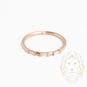 Bague - Or 10K rose diamants naturels coupe baguette sertis tension 0.15CT - RIGD387