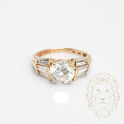Engagement ring - 10K yellow gold central stone cz cut round & cz cut tapered baguettes - RIG727