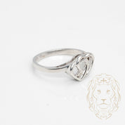 Ring - 10K white gold intertwined hearts set with a 0.06CT natural diamond - RIGD421