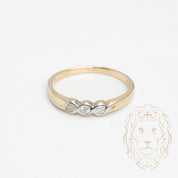 Wedding band ring - 10K two-tone yellow & white gold with three 0.10CT round brilliant cut natural diamonds set in a closed setting - RIGD422