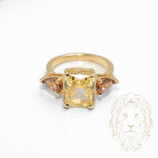 Ring - 10K Yellow Gold three radiant & pear cut cz stones - RIG734