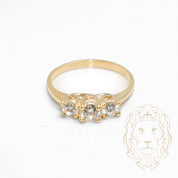 Ring - 10K Yellow Gold three brilliant round cut cz stones - RIG735