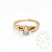 Engagement ring - 10K gold two tone yellow & white oval opal & natural diamonds 0.02CT - RIGD498