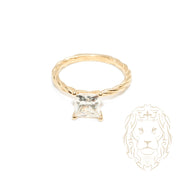 Ring - 10K Yellow Gold princess cut cz solitaire with twist setting - RIG748