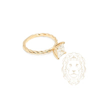 Ring - 10K Yellow Gold princess cut cz solitaire with twist setting - RIG748
