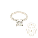 Ring - 10K white gold princess cut cz solitaire with twist setting - RIG749