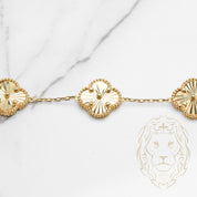 Bracelet - Or 10K jaune trèfles guillochés 14mm - BRG574