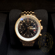 Breitling Navitimer World R243 – Or rose 18k & Cadran noir