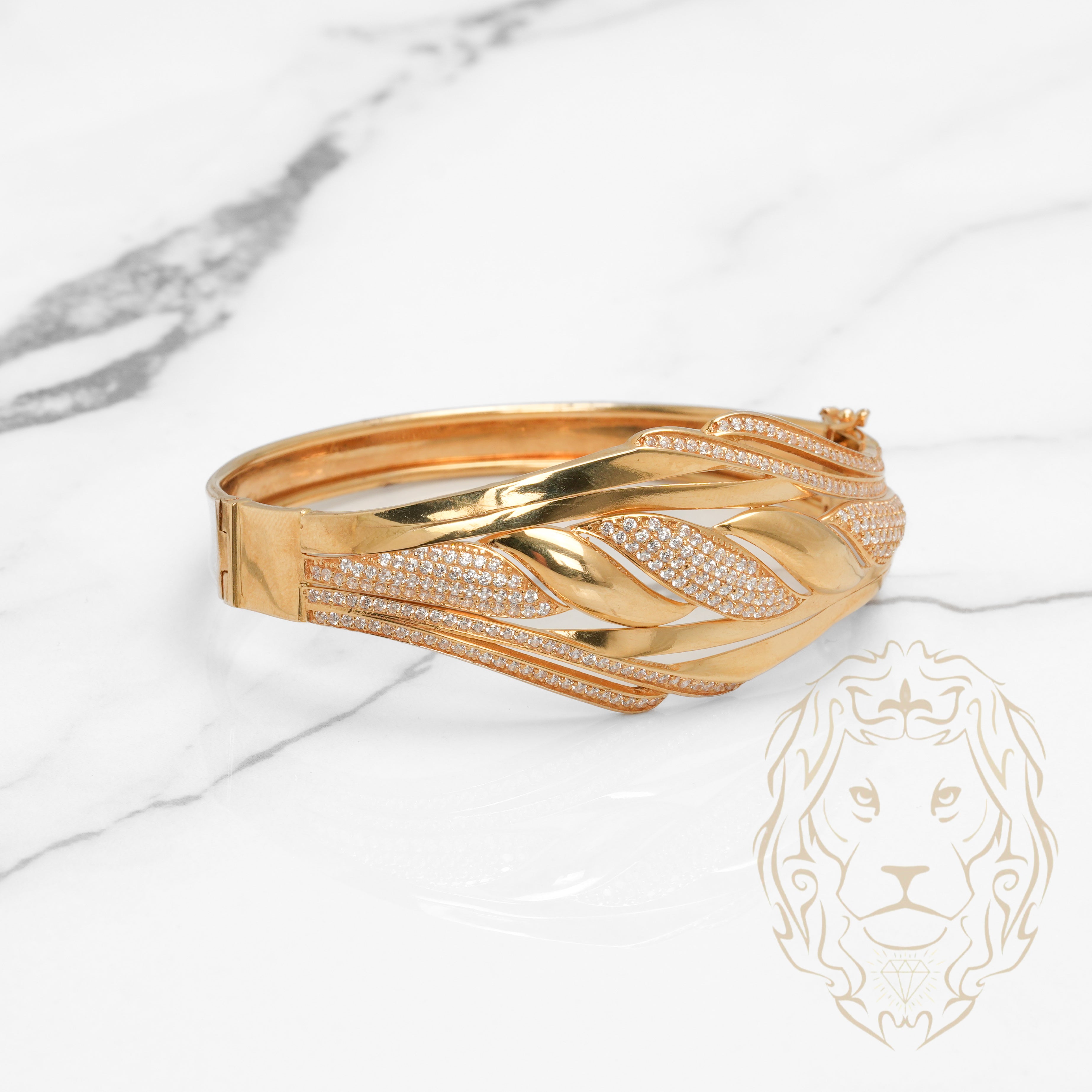 Bangle bracelet - 18K yellow gold twist pattern with CZ pavé