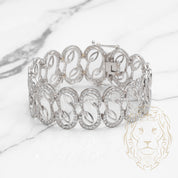 Bracelet - Or 18K blanc motif volute pavé de cz - BRG633