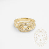 Bague - Or 10K jaune noeuds twist & pavé de cz - RIG804