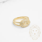 Bague - Or 10K jaune noeuds twist & pavé de cz - RIG804