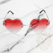 Lunettes Cartier – Cartier Picadilly Big C argent avec avec verres rouges en forme de cœur, coupe diamant dégradée – CT0092O-002