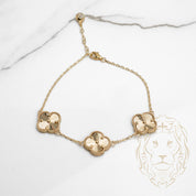 Bracelet - Or 10K jaune trois trèfles guillochés 14mm - BRG663