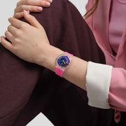 Swatch Neon Pink Podium SO28K111 watch, blue dial, on the wrist