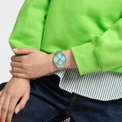 Swatch Skin The Glow of Irony SYXS155G watch, grey dial, on the wrist