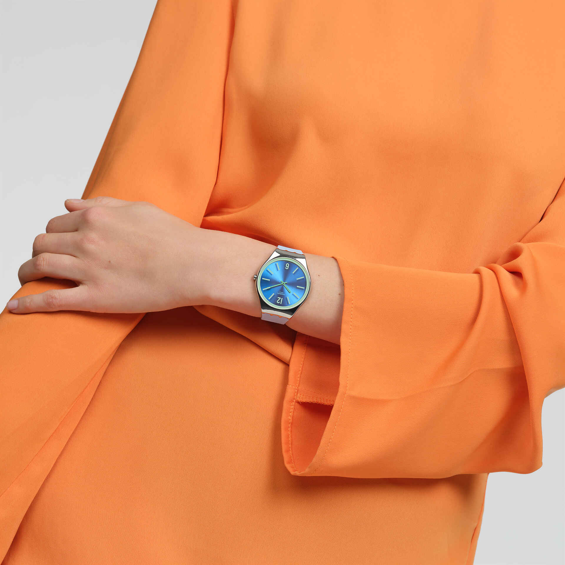 Swatch Skin Midday Sky SYXS156 watch, blue dial, on the wrist