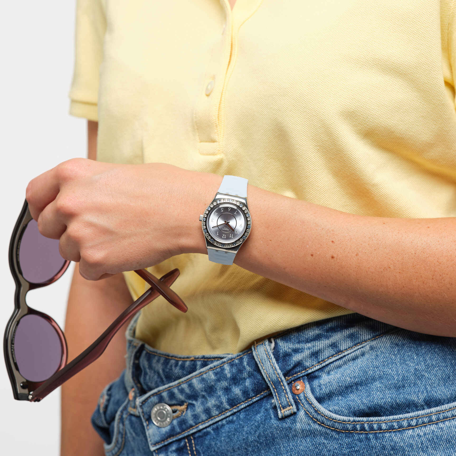 Swatch Irony Precious Aqua YLS226 watch, blue dial, on the wrist