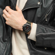 Swatch Irony By the Bonfire YVB416 watch, black dial, on the wrist