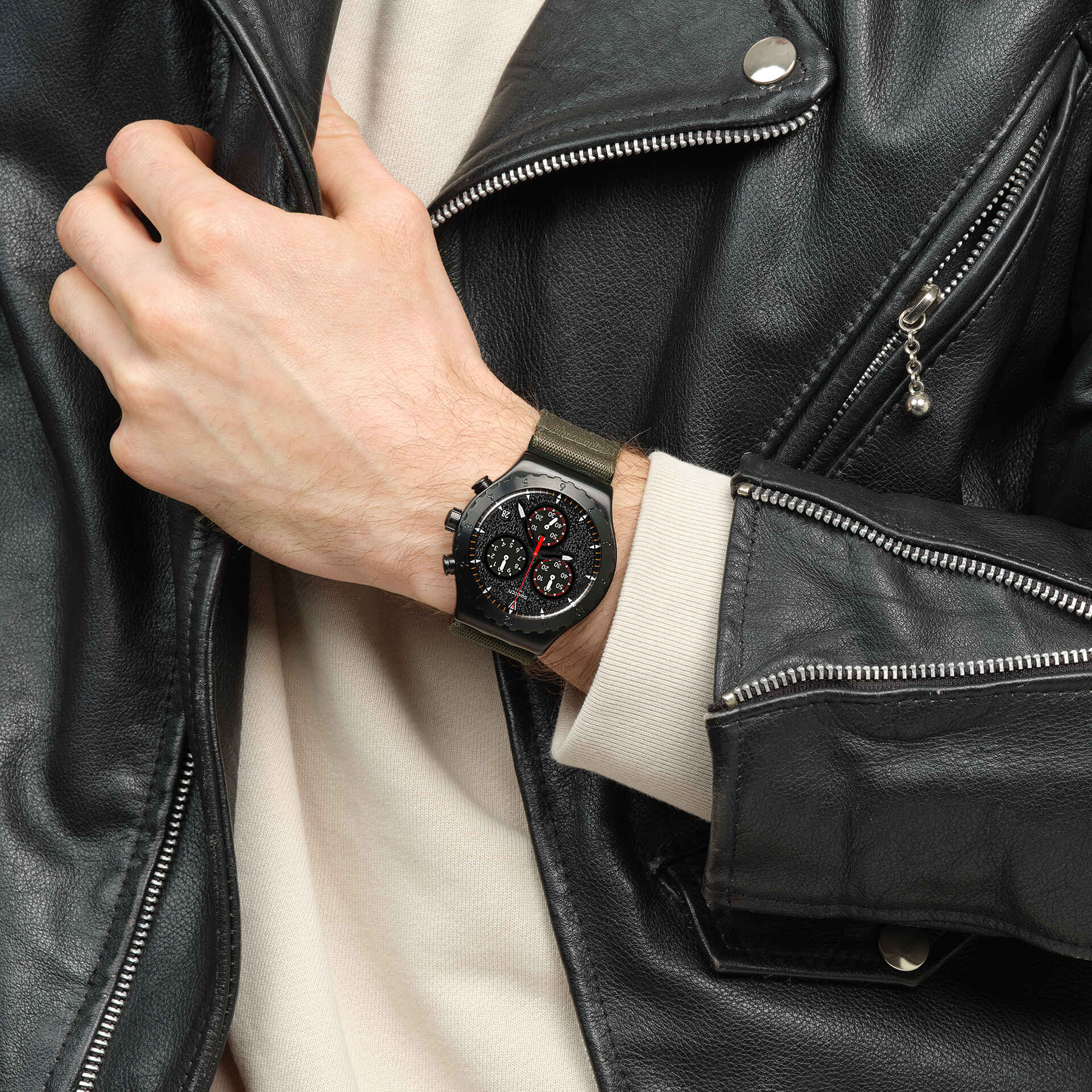 Swatch Irony By the Bonfire YVB416 watch, black dial, on the wrist